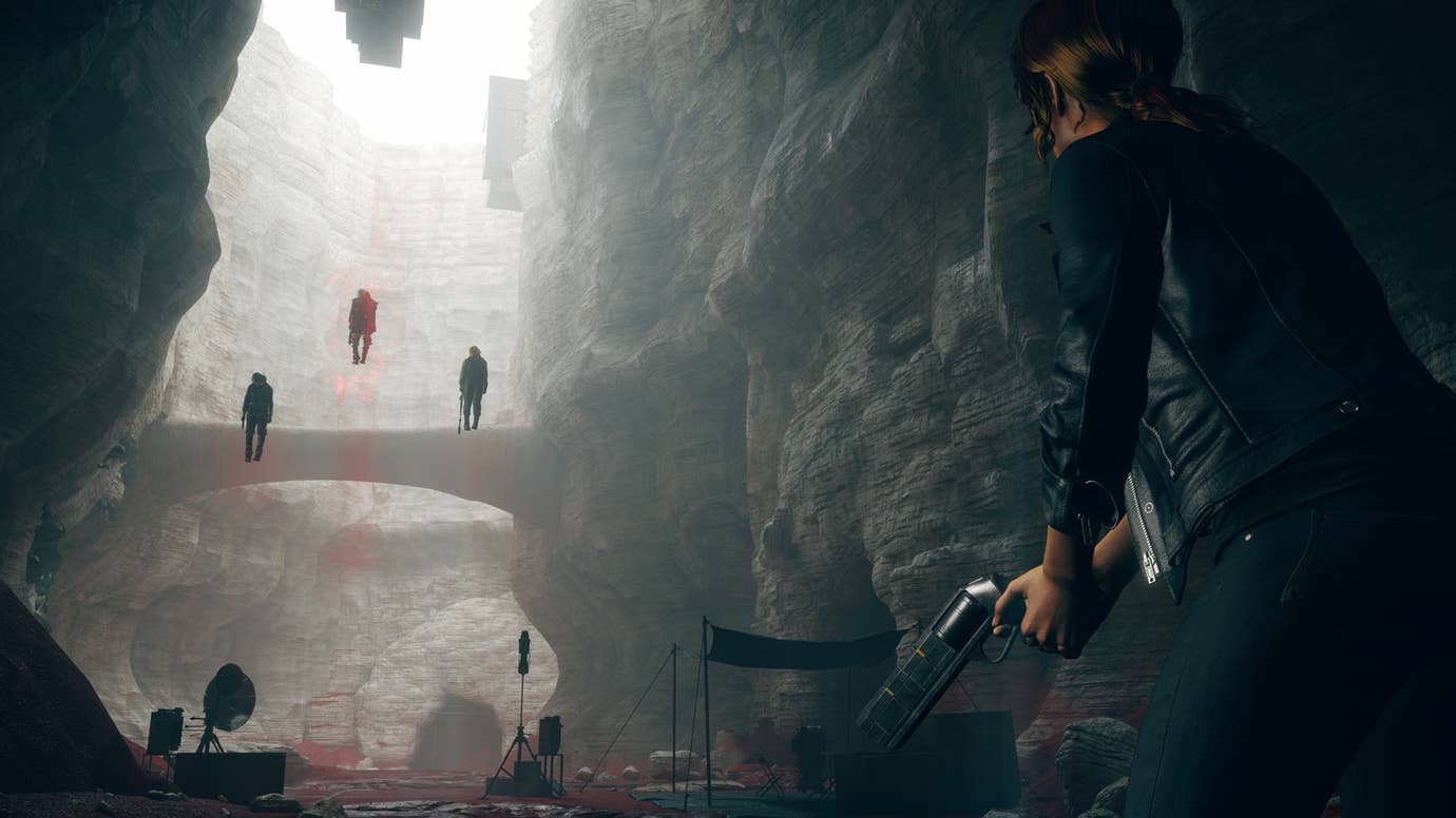 Strange figures float in the air in a huge space in Control.